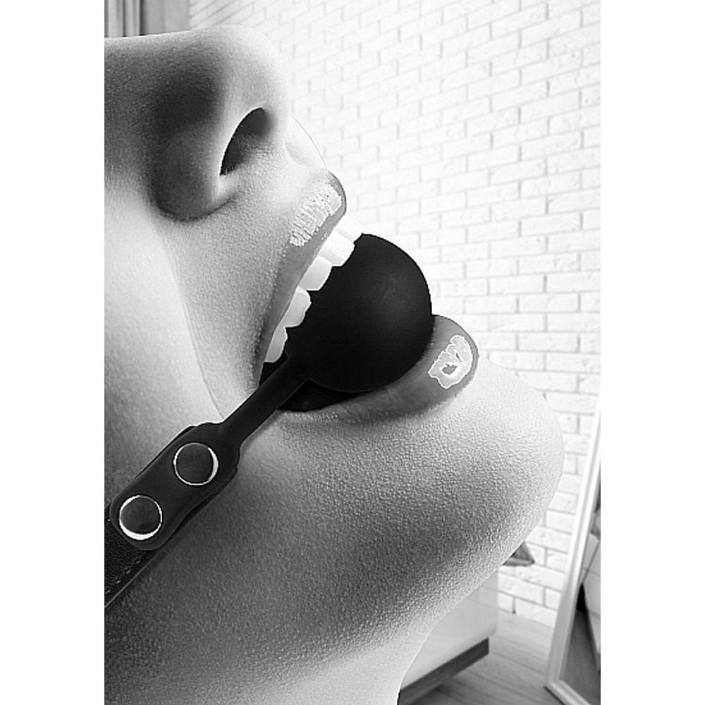 SHOTS - OUCH! BLACK & WHITE SILICONE BALL GAG WITH ADJUSTABLE BONDED LEATHER STRAPS BLACK