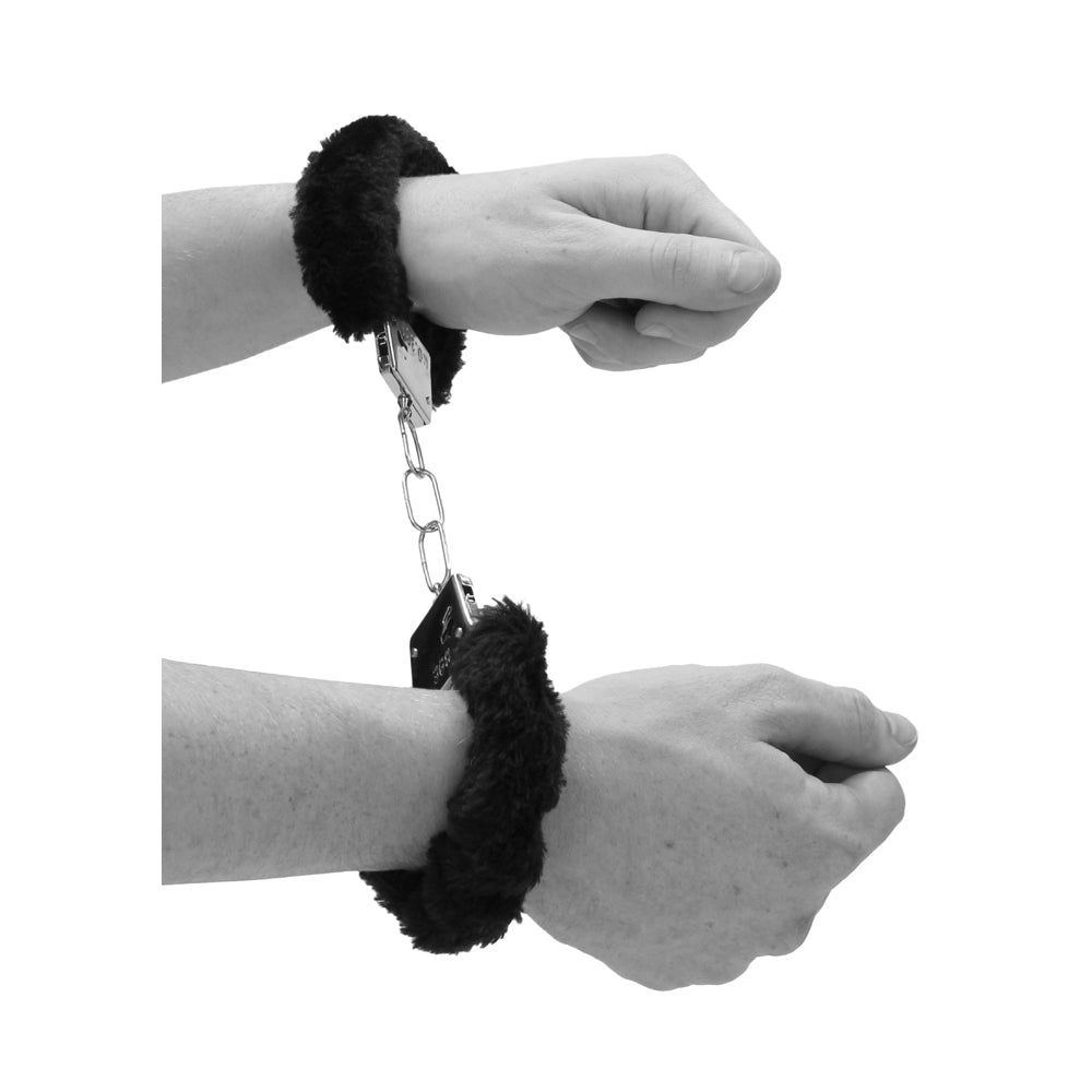 SHOTS - OUCH! BLACK & WHITE PLEASURE FURRY HANDCUFFS WITH QUICK-RELEASE BUTTON