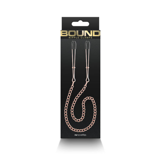 NS NOVELTIES - PINÇAS DE MAMILOS COM CORRENTE DC3 OURO ROSA