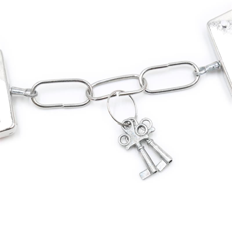 INTOYOU BDSM LINE - ESPOSAS DE METAL PARA MUÑECAS CON PELO ROSA