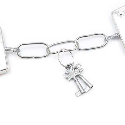 INTOYOU BDSM LINE - ESPOSAS DE METAL PARA MUÑECAS CON PELO ROSA