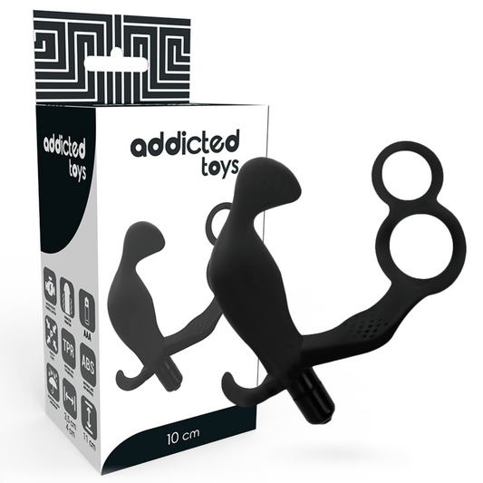 Joguines addictes: endoll anal amb anell de doble penis i testicles negres