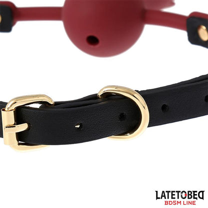 LATETOBED BDSM LINE - MORDAZA BOLA SILICONA TRANSPITABLE ADORNO ROSA AJUSTABLE 47-56 CM