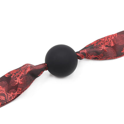 LATETOBED BDSM LINE - MORDAZA DE BOLA LISA SILICONA NEGRO/ROJO