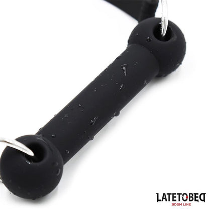 LATETOBED BDSM LINE - MORDAZA HUESO SILICONA NEGRO AJUSTABLE
