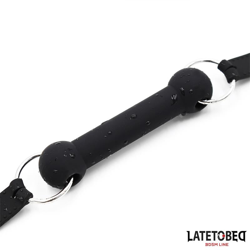 LATETOBED BDSM LINE - MORDAZA HUESO SILICONA NEGRO AJUSTABLE