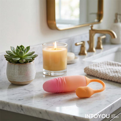 INTOYOU APP SERIES - NEXEGG MOTION HUEVO VIBRADOR CON THRUSTING APP NARANJA/ROSA
