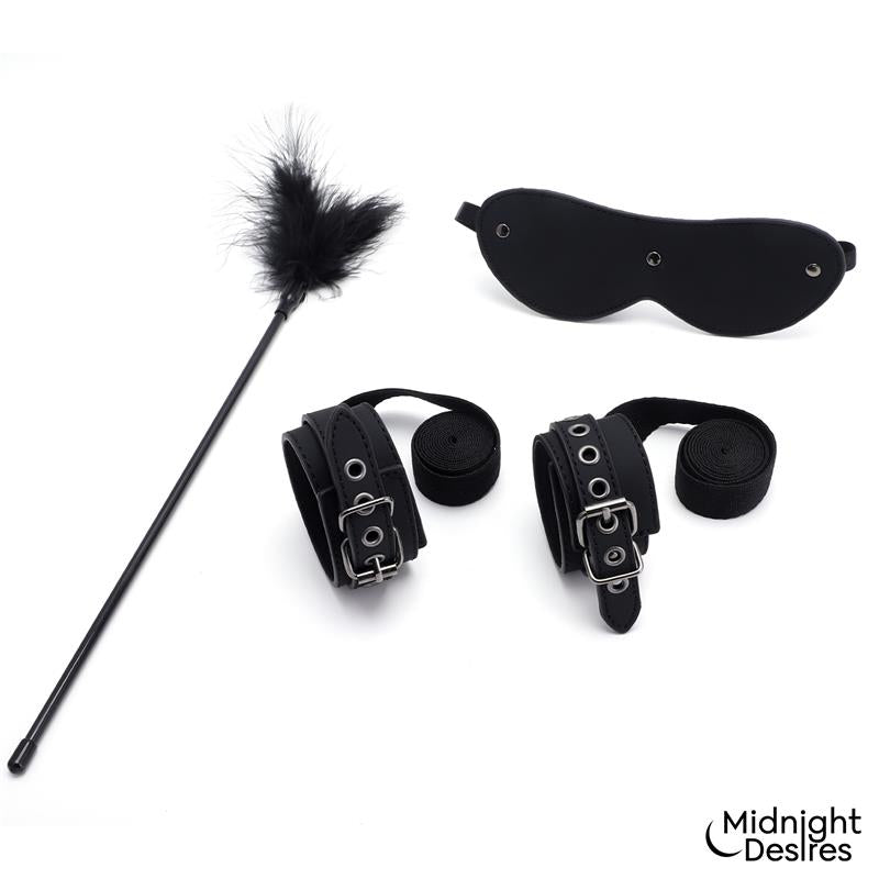 MIDNIGHT DESIRES - SET BONDAGE CON ESPOSAS, ANTIFAZ Y PLUMA ESTIMULADORA